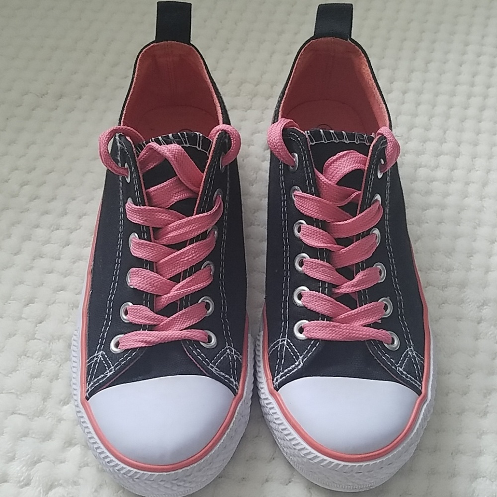 Coral and black tennis shoes